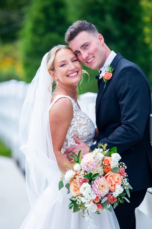 Bride and groom with the bridal bouquet